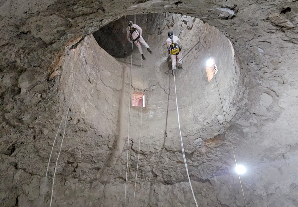Teams abseil inside cement silos to clear cylinders and hatches